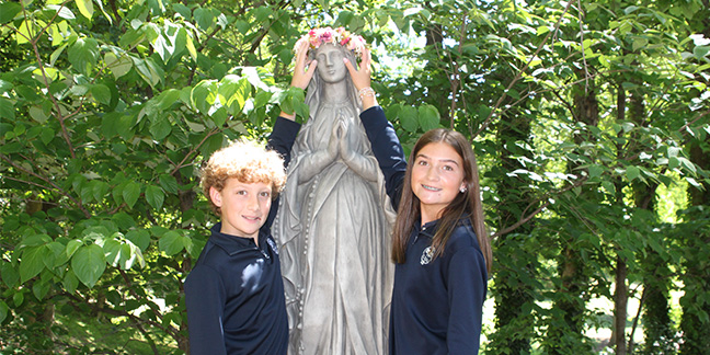 St. Pius X dedicates Marian prayer garden during May crowning