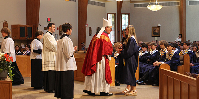 Bishop Martin urges Bishop McGuinness grads to leave their mark and remain in Him