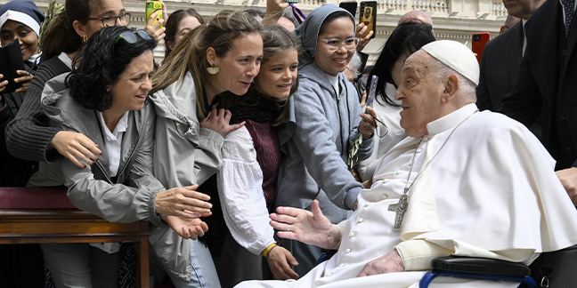 Recovering pope says to carry the cross with compassion